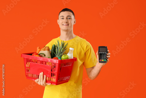 Young man with full shoppin...