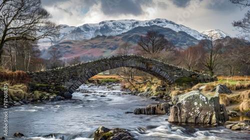 Grade 2 Listed Birks Bridge spanning the River Duddon near Seathwaite in the Duddon Valley Cumbria photo