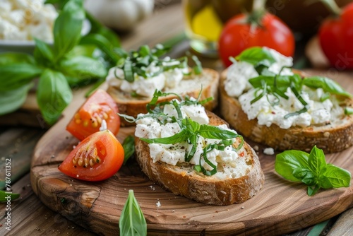 Ricotta cheese and herb sandwiches or bruschetta on wooden table
