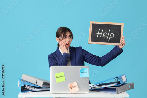 Young stressed businesswoma...