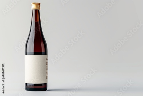 Blank label on isolated white Sake bottle photo