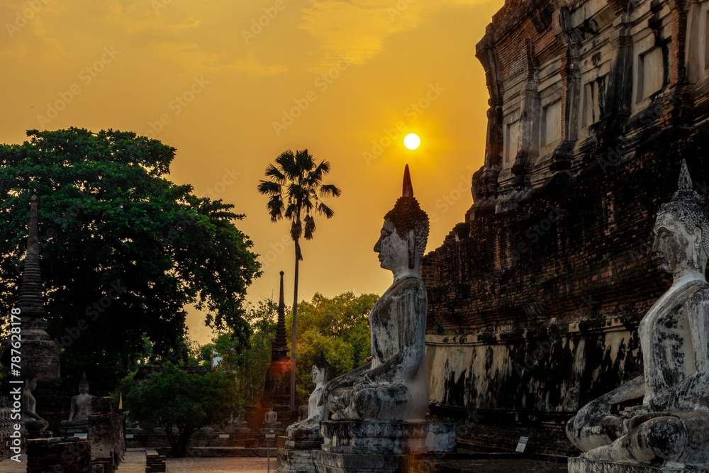 The background of important religious attractions, Wat Yai Chai Mongkhon, has an old Buddha statue and a large pagoda for tourists to study the history of Ayutthaya in Thailand.