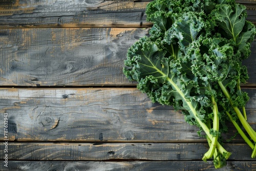 Fresh kale on rustic wooden surface