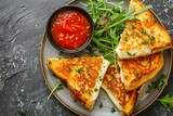 Italian grilled cheese sandwich with tomato dipping sauce and arugula salad