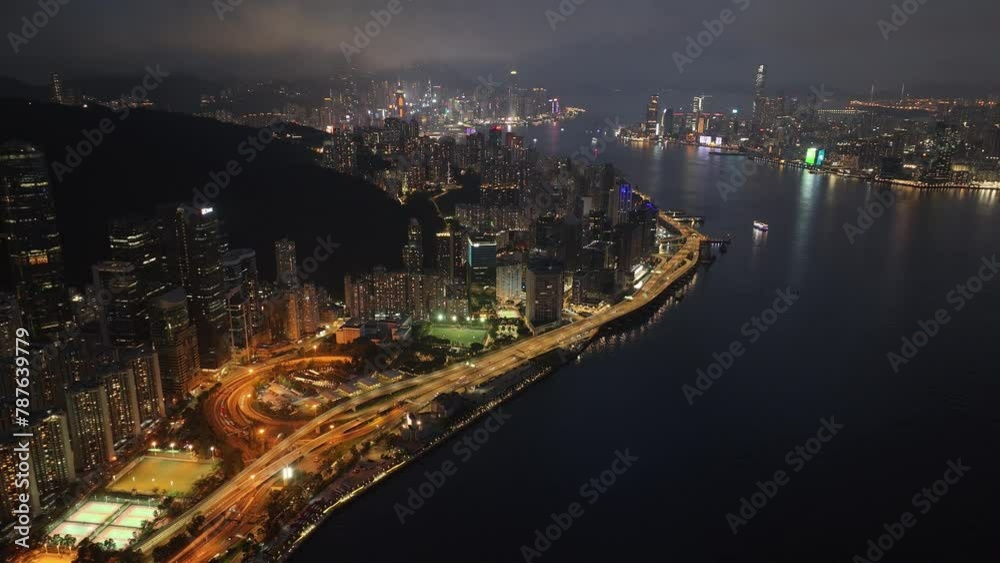 Aerial drone dusk nightfall skyview of Hong Kong Kowloon Victoria Harbour Tsim Sha Tsui Hung Hom Central Admiralty Wan Chai Causeway Bay CBD financial business Aerial drone dusk nightfall skyview of Hong Kong Kowloon Victoria Harbour Tsim Sha Tsui Hung Hom Central Admiralty Wan Chai Causeway Bay CBD financial business