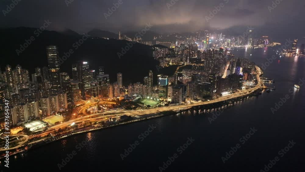 Aerial drone dusk nightfall skyview of Hong Kong Kowloon Victoria Harbour Tsim Sha Tsui Hung Hom Central Admiralty Wan Chai Causeway Bay CBD financial business Aerial drone dusk nightfall skyview of Hong Kong Kowloon Victoria Harbour Tsim Sha Tsui Hung Hom Central Admiralty Wan Chai Causeway Bay CBD financial business