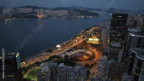 Aerial drone dusk nightfall skyview of residential and commerciall in Hong Kong East District near Victoria Harbour Kings Road in Tai Koo Shing North Point Quarry Bay Shau Kei Wan Sai Wan Ho photo