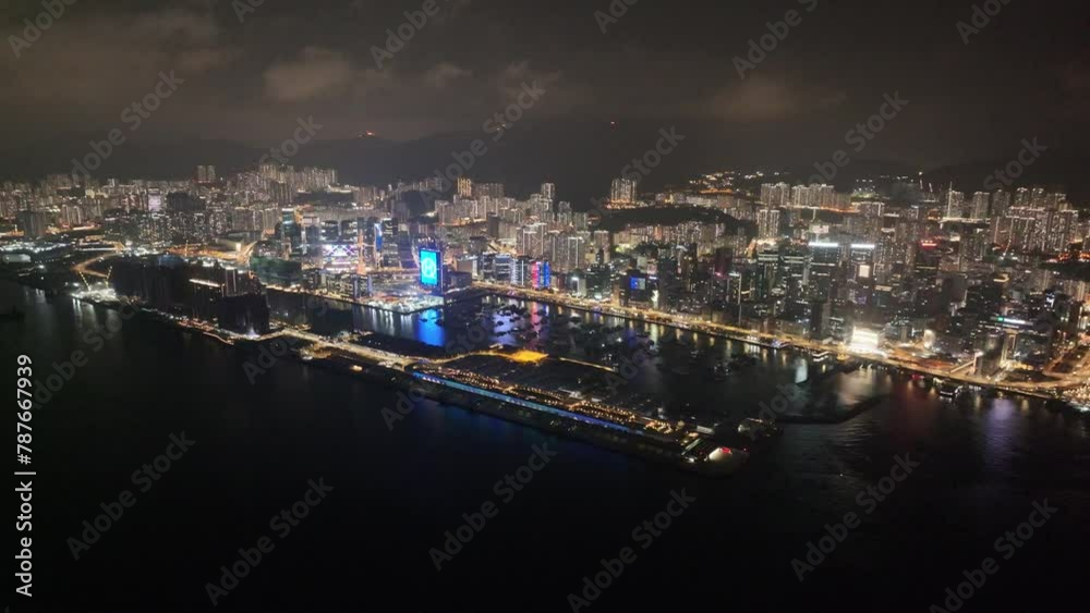 Aerial drone dusk nightfall skyview of seaside commercial residential in Kai Tak Sports Park Cruise Terminal Hong Kong Kowloon city Kwun Tong Kowloon Bay near Victoria harbor, Aerial drone skyview Aerial drone dusk nightfall skyview of seaside commercial residential in Kai Tak Sports Park Cruise Terminal Hong Kong Kowloon city Kwun Tong Kowloon Bay near Victoria harbor, Aerial drone skyview
