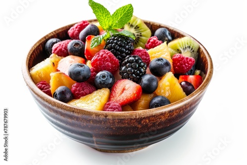 Fruit salad in bowl on white surface