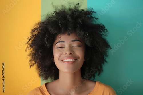 Happy young woman with afro hairstyle against colored background - generative ai