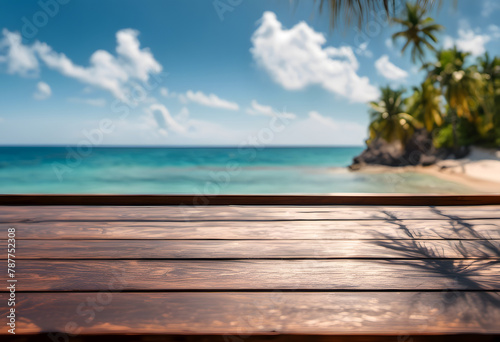 Wooden table overlooking a tropical beach with clear blue water and palm trees, creating a serene vacation backdrop.