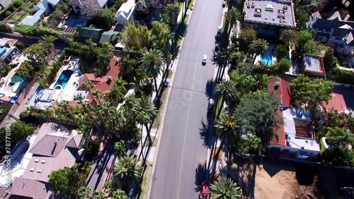 Aerial Tilt Up Scenic View Of Houses In Residential City Against Clear Sky, Drone Flying Forward On Sunny Day - Beverly Hills, California