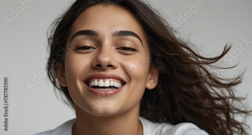 young hispanic woman on plain bright white background laughing hysterically looking at camera background banner template ad marketing concept from Generative AI