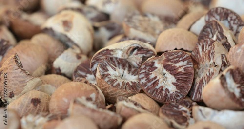 Close up of Dried betel nut,Drying Areca Nut background photo