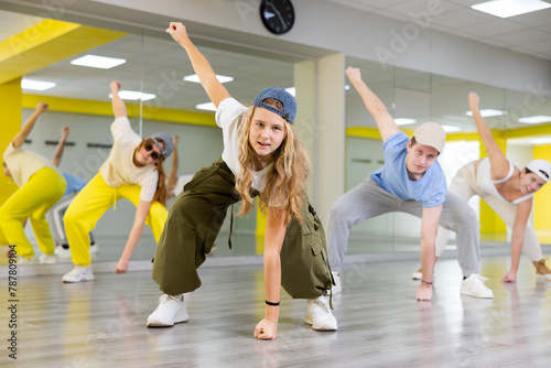 Active teens learn new dance moves in dance studio