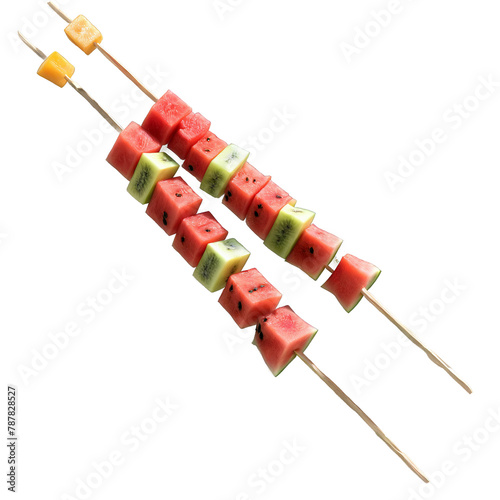 Breakfast fruit kebabs with cubes of watermelon honeydew and cantaloupe threaded onto skewers and served © panophotograph