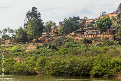 Village above waters of Nam Ou 3 reservoir, Laos