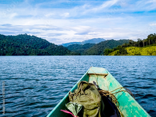 green natural, boad on lake, fishing, lifestyle in countryside photo