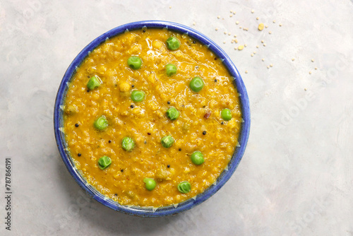 Healthy Quinoa dal khichdi. Made with quinoa, lentils, veggies, and spices, this quinoa dal khichdi is a one pot nutritious weight loss meal. Served with yogurt or curd. Copy Space