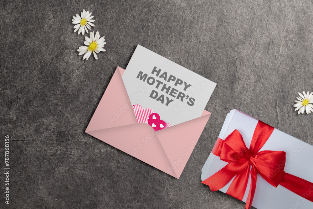 The letter with Happy Mother's Day text and a gift box - obrazy, fototapety, plakaty 