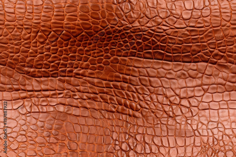 Photograph of textured leather, showcasing its grain patterns, natural wrinkles, and rich, tactile surface. Photograph of textured leather, showcasing its grain patterns, natural wrinkles, and rich, tactile surface.
