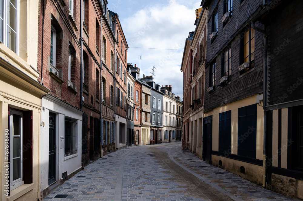 old cozy street with historic half timbered buildings in the the beautiful town of Honfleur, France with nobody