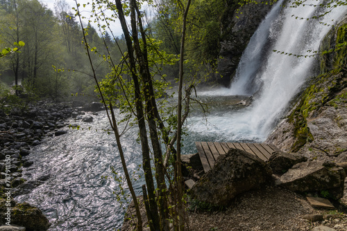 Bovec, Slovenia. Visje waterfalls. Nature trail crystal clear, turquoise water. easy trekking, nature experience, wood path. Waterfalls inside a forest, long photographic exposure, power of nature. photo