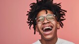 A dental ad featuring a humorous man with curly hair and braces who wears glasses and showcases a bright smile with white teeth against a pink background.