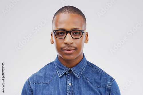 Serious, portrait and black man in creative career for media company, magazine publication and newspaper isolated on white background. Mockup, face and young graduate for internship in writing job photo