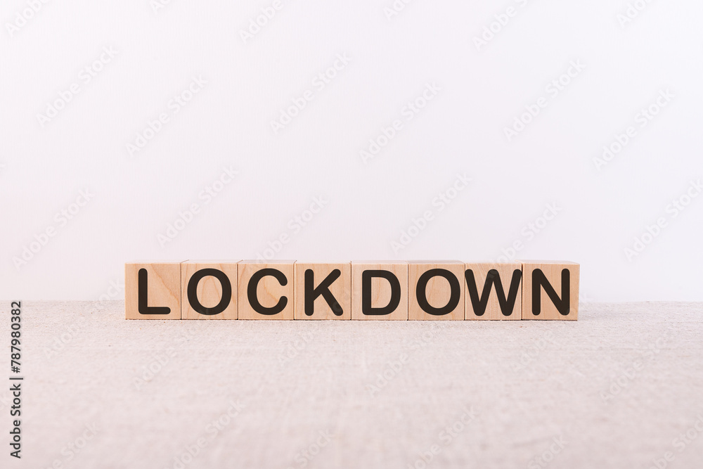 Lockdown word made with wood building blocks. Lockdown word made with wood building blocks.