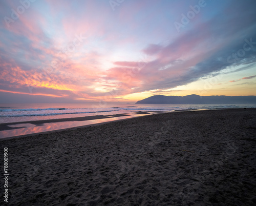 beach in tuscany at sunset