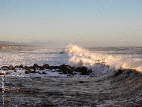 Crashing waves on the beach in massa