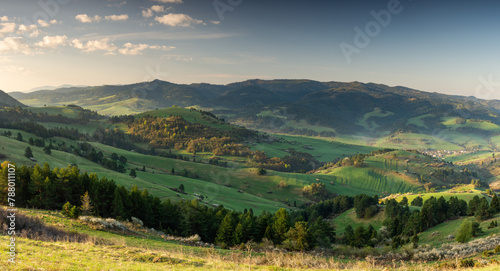 Gree hills and meadows at Pieniny Mountains. Beautiful wide spring panoramic view from. Wysoki Wierch, Poland and Slovakia. © Marcin Mucharski