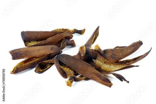 Old ugly rotten spoiled banana peel, over ripe fruit isolated on a white background, copy space.