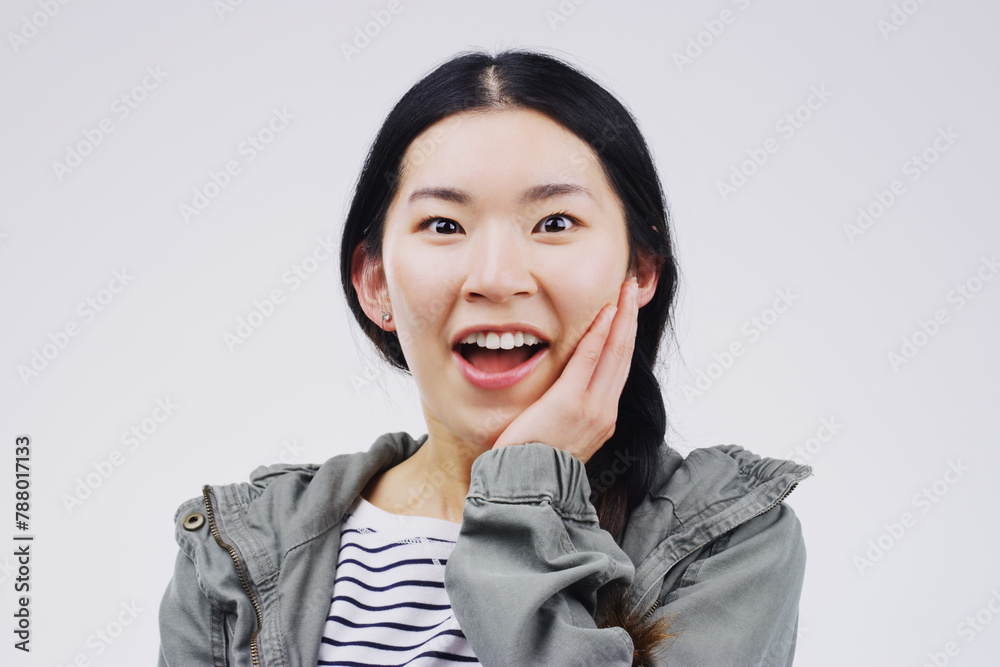 Studio, shock and asian woman in portrait with face, wow or mind blown