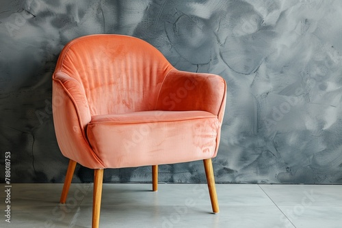Contemporary peach velour chair trend color 2024 wood legs grey backdrop photo