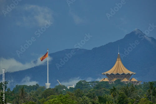 Sarawak's new flagpole near the Sarawak State Legislative assembly building with Mount Serapi on the background.