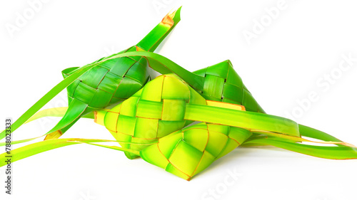 Ketupat pillow or Diamond rice Eid specialty food isolated on a white background, in indonesia called (Ketupat Bantal) because of the various forms available photo