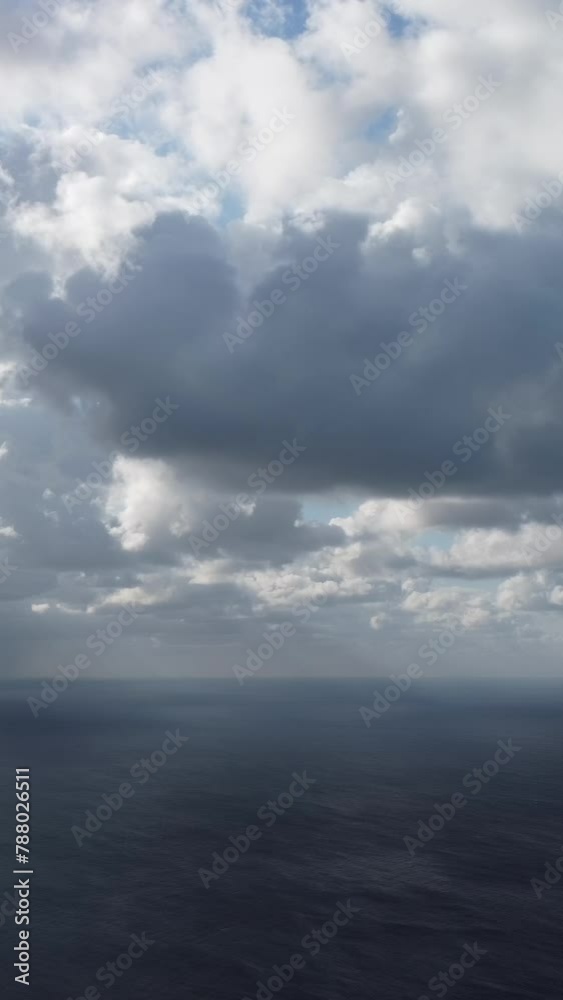 Aerial view. Dramatic sunset with sea and gloomy clouds. Abstract aerial nature summer ocean sunset sea and sky background. Horizon. Vacation, travel and holiday concept. Weather and climate change Aerial view. Dramatic sunset with sea and gloomy clouds. Abstract aerial nature summer ocean sunset sea and sky background. Horizon. Vacation, travel and holiday concept. Weather and climate change