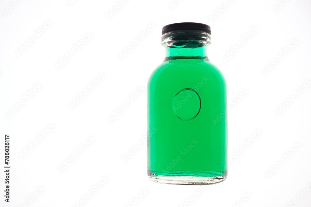 Medical medicine bottles with green liquid with syringe friendly plastic cap Thailand Asia Medical medicine bottles with green liquid with syringe friendly plastic cap Thailand Asia