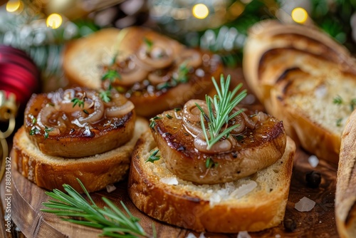 Focus on French foie gras and bread on wooden plate with Christmas decor and onion marmalade for celebration photo