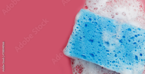 Wallpaper Mural Cleaning sponge in foam of dishwashing liquid. Washing dishes concept Torontodigital.ca