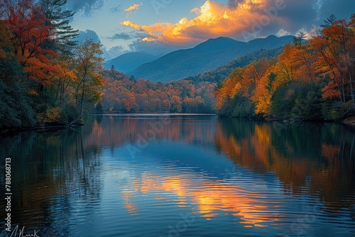 High resolution photo of the Blue "Tah tvic lake" in North Carolina during fall with beautiful colorful trees and mountains in the background with clouds reflecting on the water at sunset. 