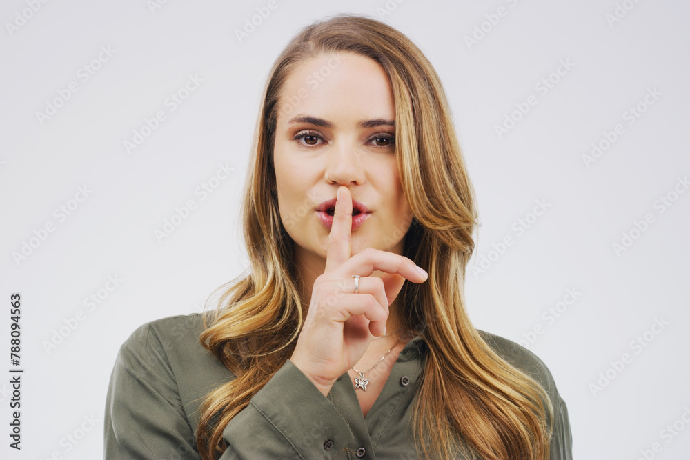 Woman, portrait and finger with hush, studio and silence for mystery announcement. Model, gossip and secret with rumor, whisper and gesture for news or noise with confidential on white background Woman, portrait and finger with hush, studio and silence for mystery announcement. Model, gossip and secret with rumor, whisper and gesture for news or noise with confidential on white background
