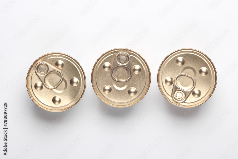 Cans with canned pet food on white background. Top view. Flat lay Cans with canned pet food on white background. Top view. Flat lay