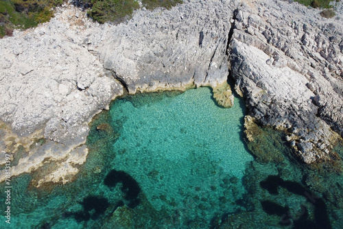 Aerial photo of turquise little bay coast and sea  in croatia 