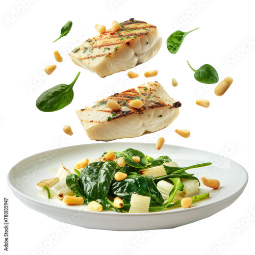 floated Grilled Halibut with Spinach, leeks and Pine Nuts falling into a plate isolate on transparency background PNG
