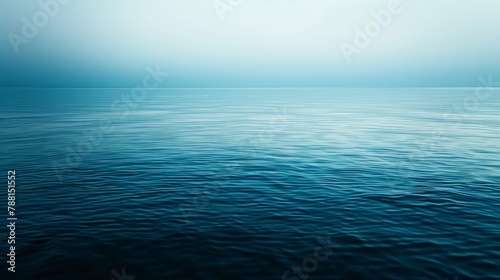 Tranquil Blue Ocean Water With Hazy Fog, Perfect for Relaxation and Travel Brochures