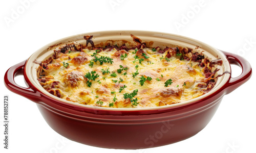 Deliciously baked casserole topped with golden cheese and fresh herbs, presented in a red ceramic dish placed on a bright background