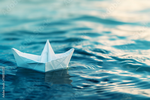 White paper boat on the open sea, close-up